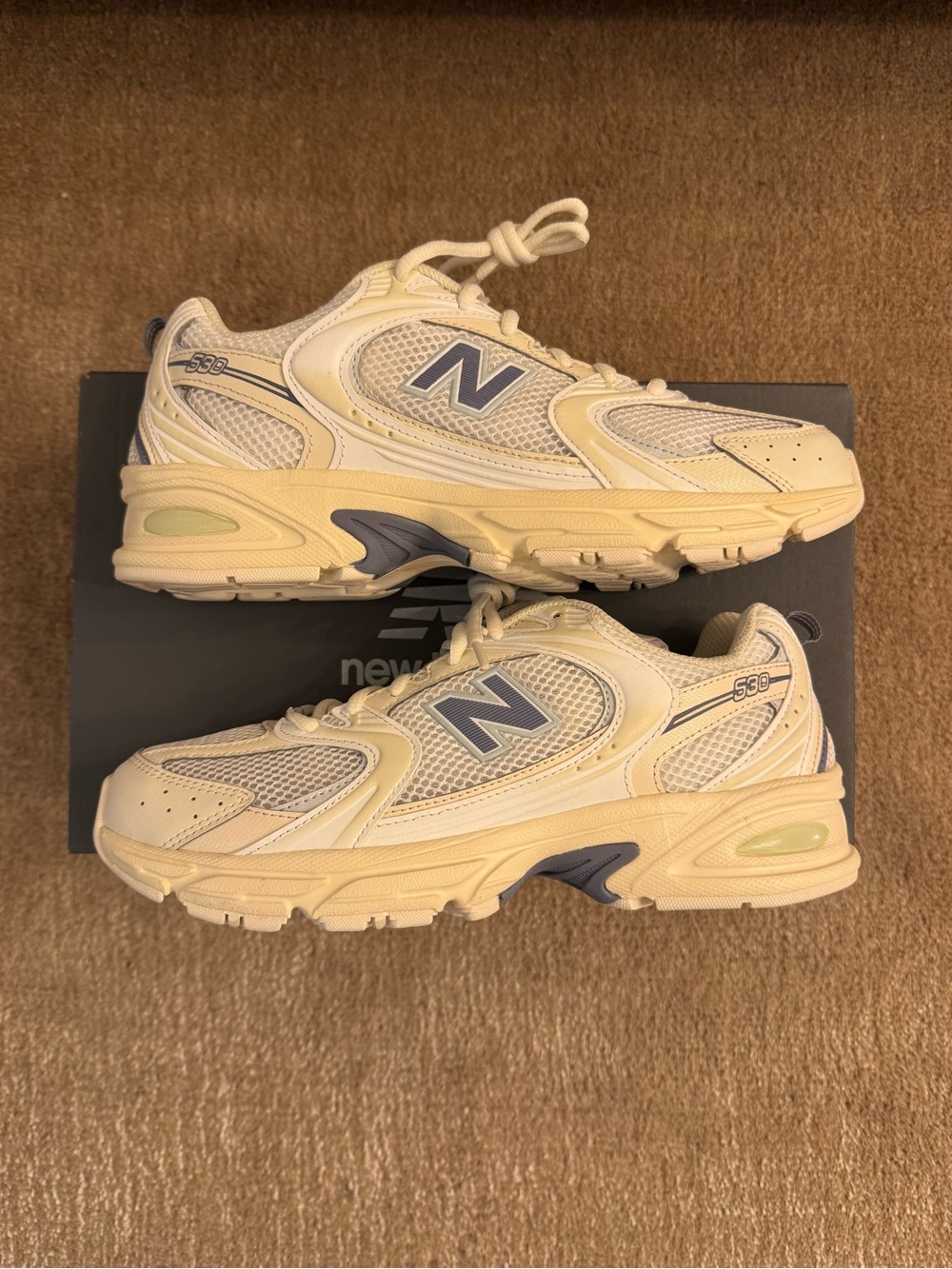 New Balance Cream Sneakers with Light Blue Accents